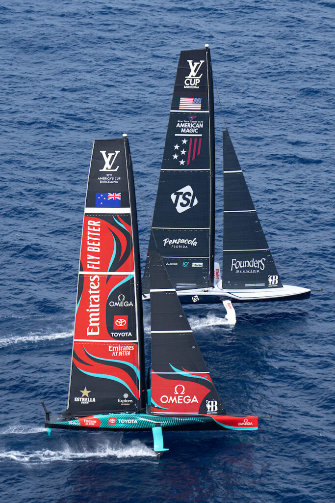 American Magic passing Emirates Team New Zealand