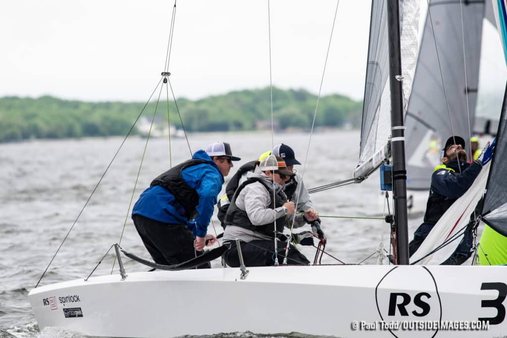 Two men on a sailboat