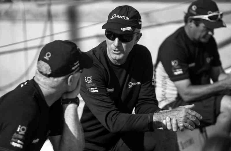 Constructive dialogue after racing is one of the single most important steps to improving. Designate someone on the team to lead the discussions, share notes, and carry over action items to the next day's sailing. Here, Ed Baird and Terry Hutchinson rehash a day of TP52 racing.