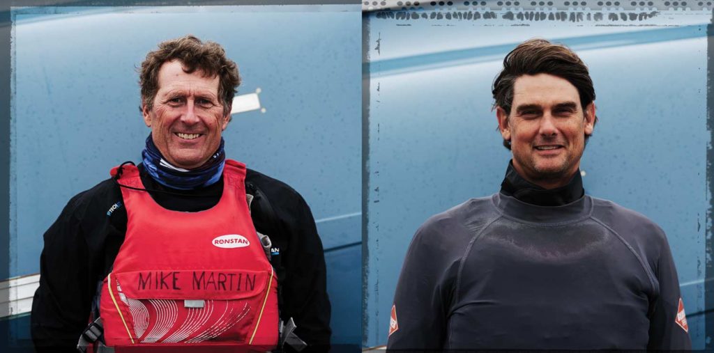 Two men in sailing uniforms.