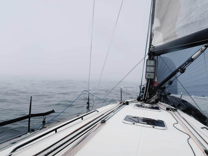 sailboat in the fog