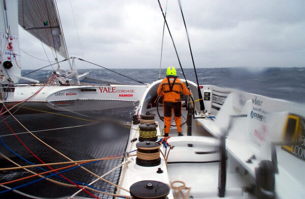 SAILING: THE RACE 2000 / TEAM ADVENTURE INBOAR An unidentified helmsman stares down the Southern Pacific Ocean during the 2000/2001 sailing of the The Race.